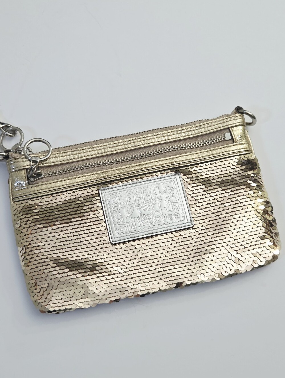 COACH POPPY SEQUIN WRISTLET - GOLD